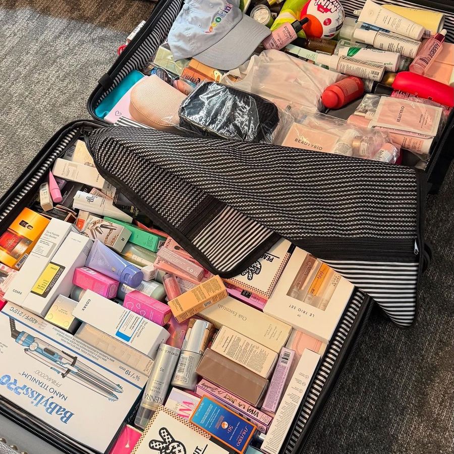 A suitcase filled with unused beauty products